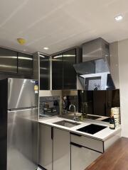 Modern kitchen with stainless steel appliances