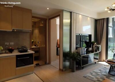 modern apartment living area with kitchen and bathroom