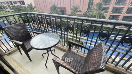 Balcony with seating and pool view