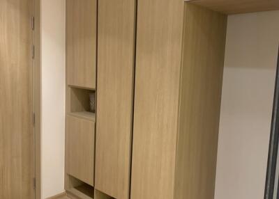 Built-in wooden storage cabinet in room