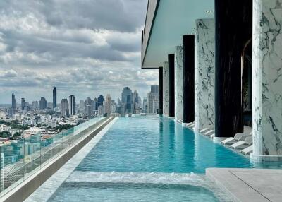 Infinity pool with city skyline view