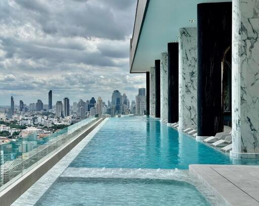 Infinity pool with city skyline view