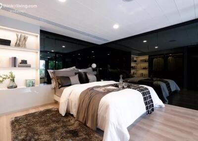 Modern bedroom with large bed and stylish decor