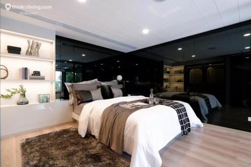 Modern bedroom with large bed and stylish decor