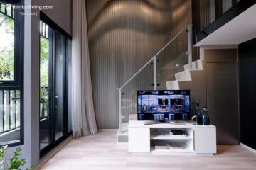 Modern living room with staircase