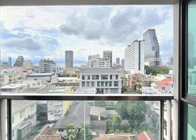 View from a building balcony overlooking cityscape