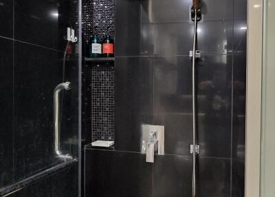 Modern bathroom with glass shower enclosure