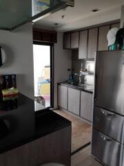 Modern kitchen with stainless steel appliances