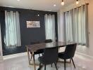 Modern dining room with marble table and chairs