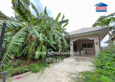 Front view of a house with a garden