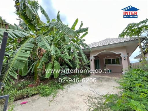 Front view of a house with a garden