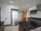 Modern kitchen with stainless steel appliances