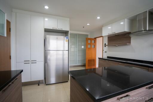 Modern kitchen with stainless steel appliances