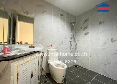 Modern bathroom with shower and toilet