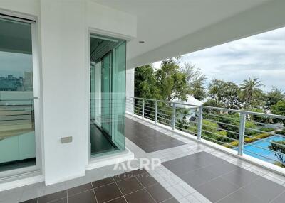 Spacious balcony with railing and tiled floor