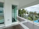 Spacious balcony with railing and tiled floor