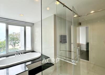 Modern bathroom with glass shower and bathtub