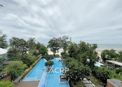 Outdoor view with swimming pool and beach