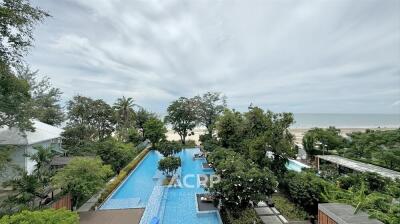 Outdoor view with swimming pool and beach