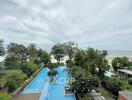 Outdoor view with swimming pool and beach