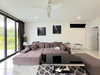 Modern living room with large corner sofa