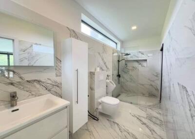 Modern bathroom with white marble finish