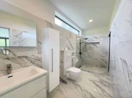 Modern bathroom with white marble finish