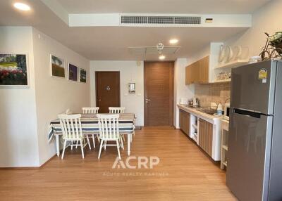 Modern kitchen and dining area with appliances