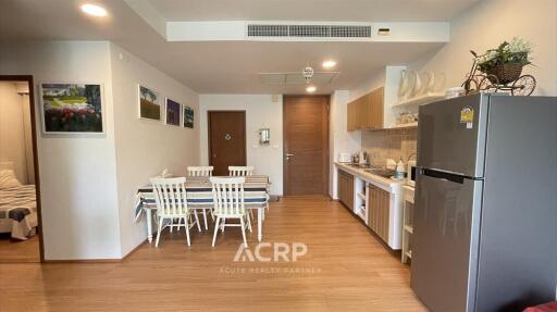 Modern kitchen and dining area with appliances