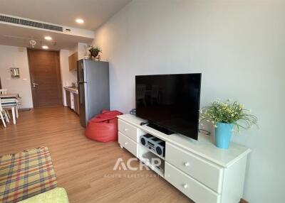 Modern living room with dining area and kitchen