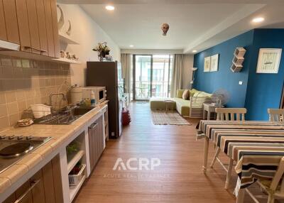 Spacious open-plan kitchen and living area with modern furnishings