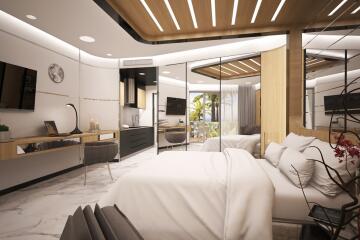 Modern bedroom with attached kitchenette and seating area