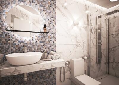 Modern bathroom with tiled walls and glass shower