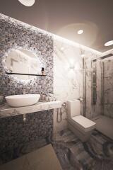 Modern bathroom with tiled walls and glass shower