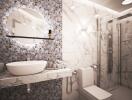 Modern bathroom with tiled walls and glass shower