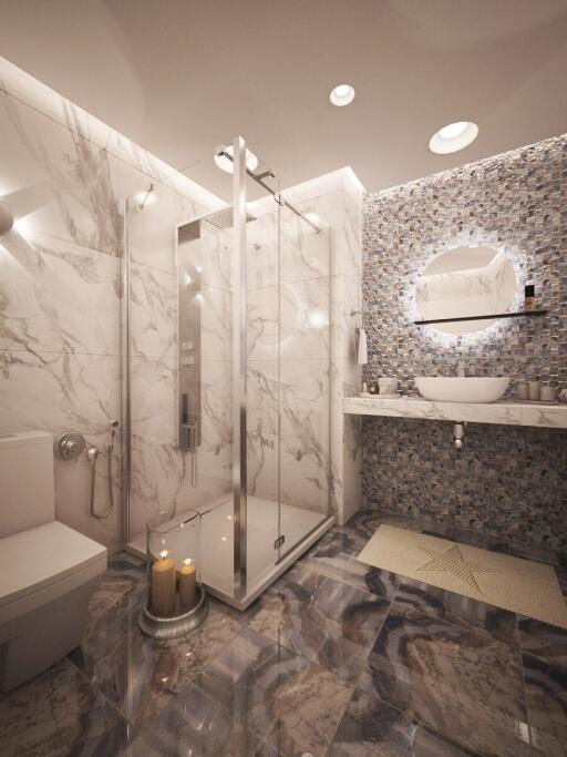 Modern bathroom with marble finishes and walk-in shower