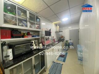 Modern kitchen with appliances and storage space