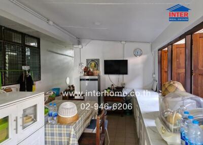 Traditional kitchen setup with dining table and appliances