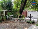 Peaceful garden with seating area and fountain