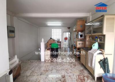 Kitchen and dining area with cabinets and appliances