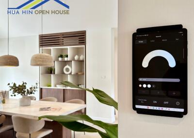 Modern dining area with smart home controls