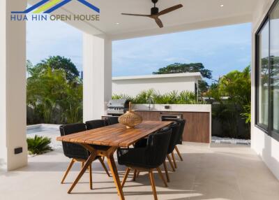 Outdoor dining area with table and chairs