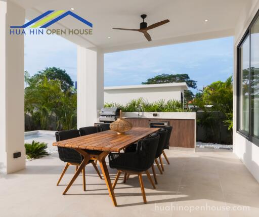 Outdoor dining area with table and chairs