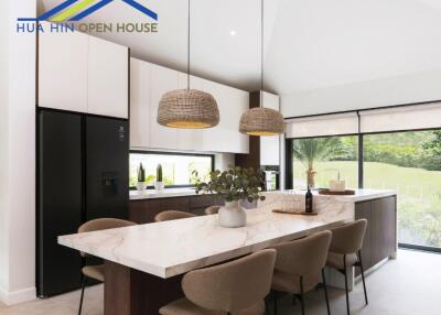 Modern kitchen with island and dining area