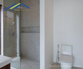 Modern bathroom with shower and toilet