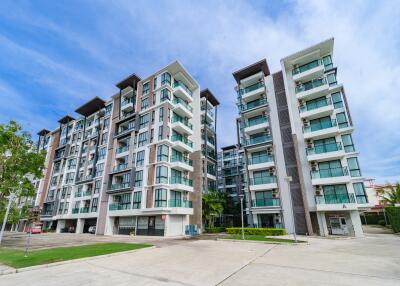 Modern apartment buildings with large windows and balconies