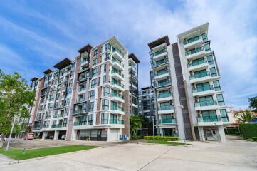 Modern apartment buildings with large windows and balconies