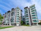 Modern apartment buildings with large windows and balconies