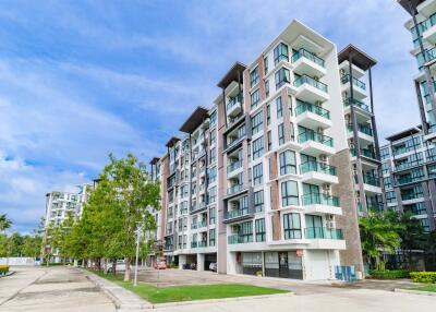 Modern apartment building exterior with multiple balconies