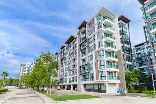 Modern apartment building exterior with multiple balconies